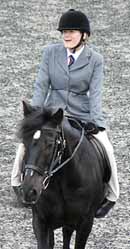 Emma riding Jet